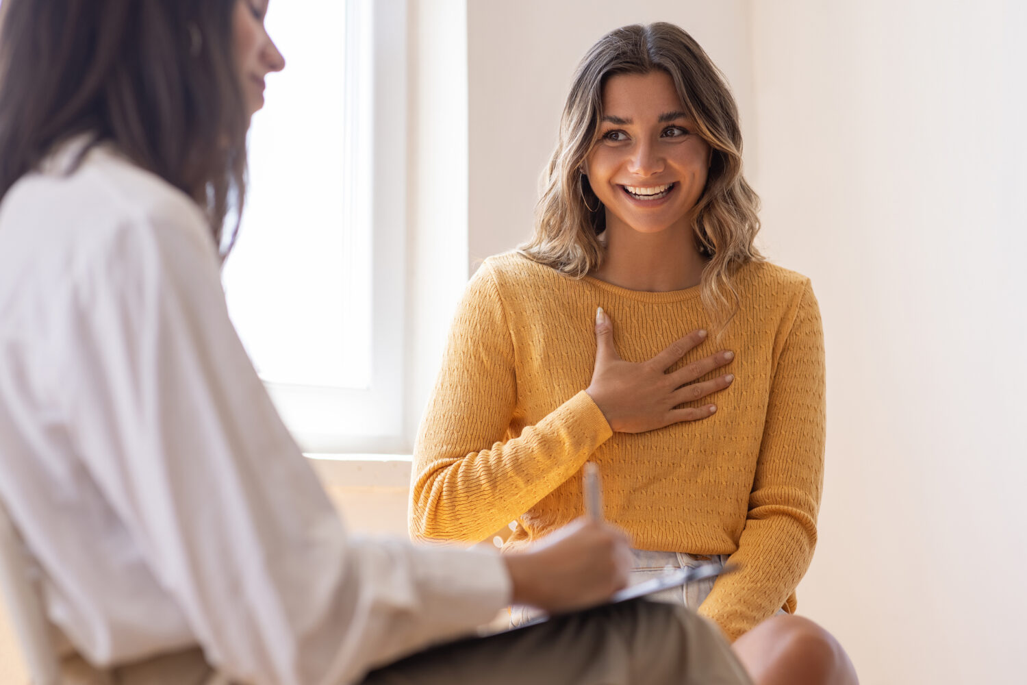 woman at clinic talking to a doctor